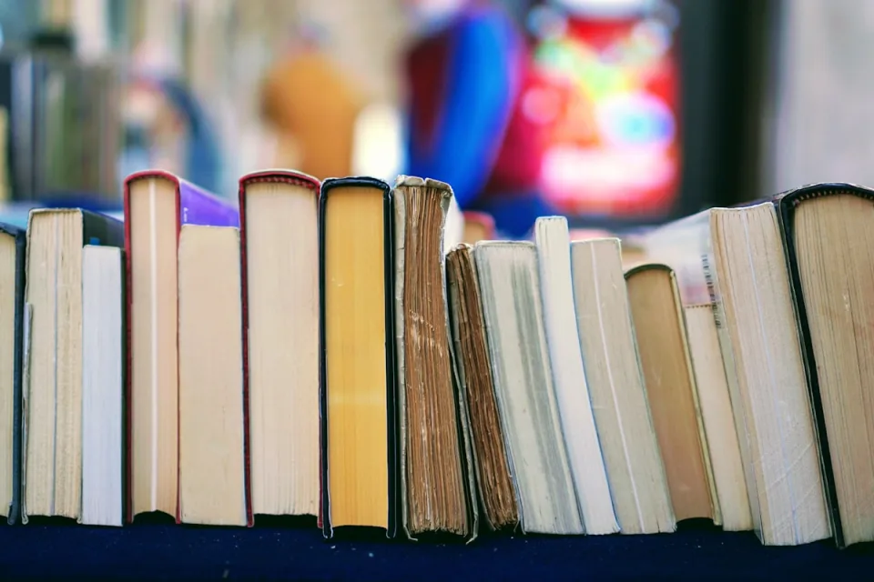 Stack of hardcover books ready to share